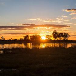 Sonnenuntergang im Okavango Delta, Botswana